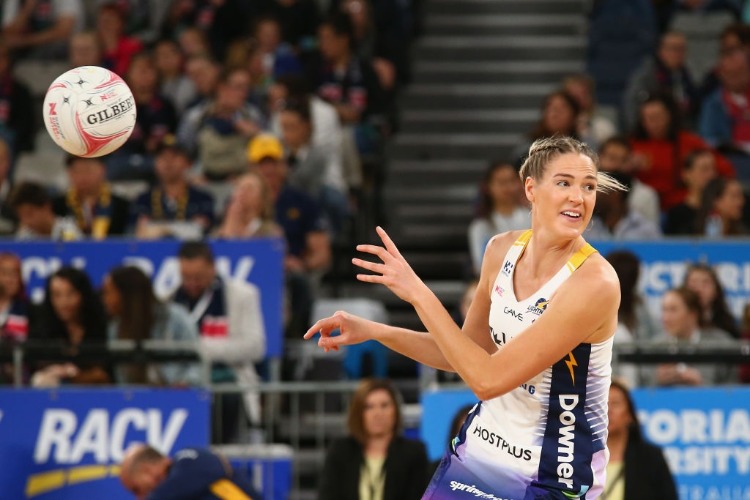 CAITLIN BASSETT of the Lightning throws the ball prior to Super Netball match between the Vixens and the Lightning at Hisense Arena in Melbourne, Australia.