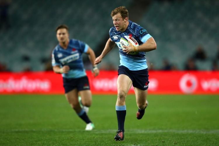 CAMERON CLARK of the Waratahs makes a break during the Super Rugby match between the Waratahs and the Jaguares at Allianz Stadium in Sydney, Australia. CAMERON CLARK of the Waratahs makes a break during the Super Rugby match between the Waratahs and the Jaguares at Allianz Stadium in Sydney, Australia.