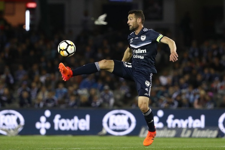 CARL VALERI of the Victory controls the ball during the A-League match between Melbourne Victory and Melbourne City FC at Etihad Stadium in Melbourne, Australia.