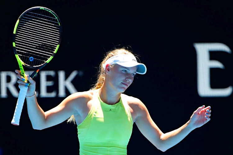 CAROLINE WOZNIACKI of Denmark reacts against Jana Fett of Croatia of the 2018 Australian Open at Melbourne Park in Australia.