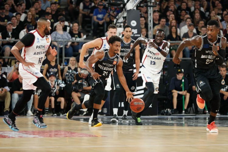 CASPER WARE of Melbourne United runs with the ball during the NBL Grand Final series between Melbourne United and the Adelaide 36ers at HA in Melbourne, Australia.