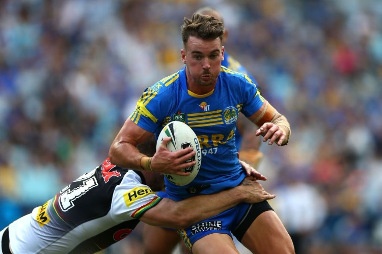 CLINT GUTHERSON of the Eels is tackled during the NRL match between the Parramatta Eels and the Penrith Panthers at ANZ Stadium in Sydney, Australia.