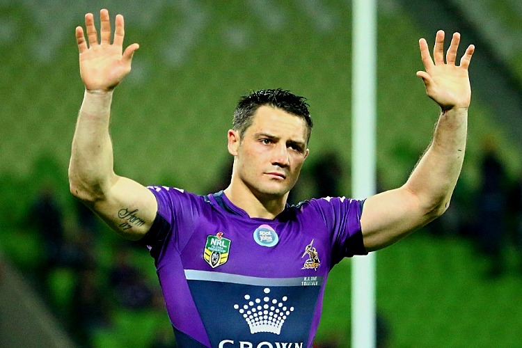 COOPER CRONK of the Melbourne Storm thanks the crowd after the NRL Second Preliminary Final match at AAMI Park in Melbourne, Australia.