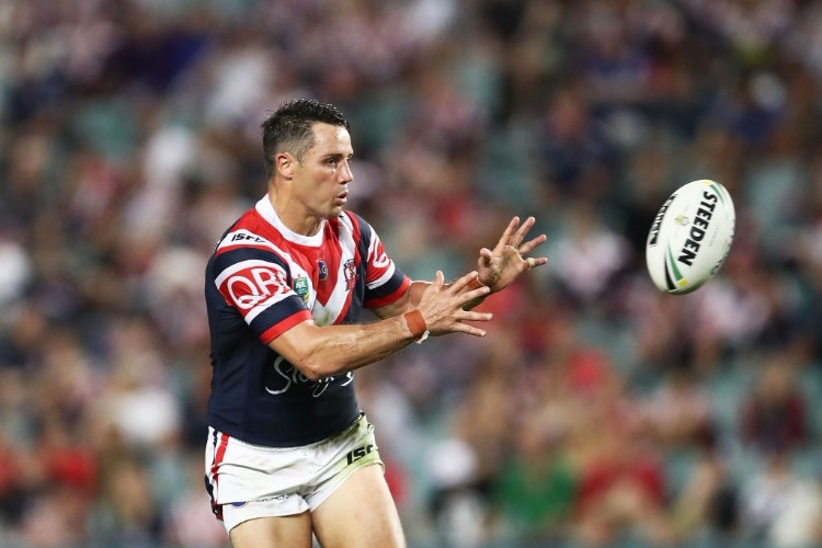 COOPER CRONK of the Roosters catches the ball during the NRL match between the Sydney Roosters and the Canterbury Bulldogs at Allianz Stadium in Sydney, Australia.