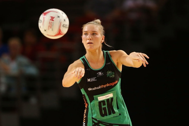 COURTNEY BRUCE of the Fever passes during the Super Netball match between the Giants and the West Coast Fever at Qudos Bank Arena in Sydney, Australia.