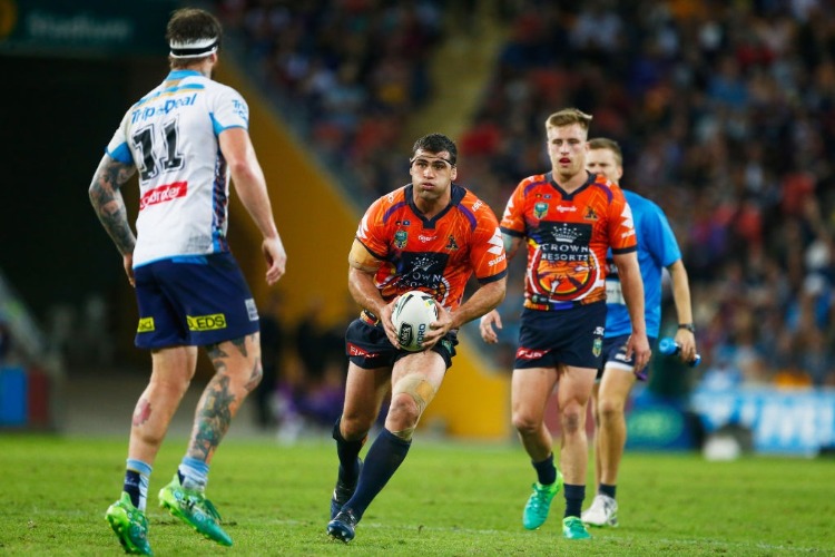 DALE FINUCANE of the Storm runs with the ball during the NRL match between the Melbourne Storm and the Gold Coast Titans at Suncorp Stadium in Brisbane, Australia.