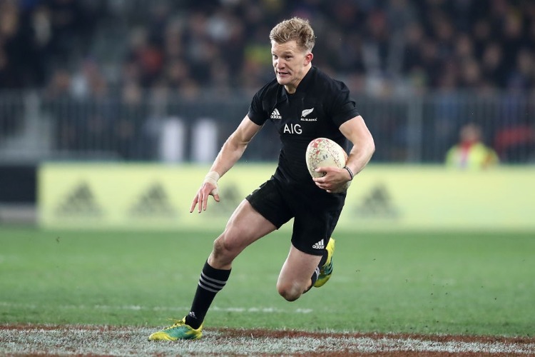 DAMIAN MCKENZIE of the All Blacks makes a break during the International Test match between the New Zealand All Blacks and France at Forsyth Barr Stadium in Dunedin, New Zealand.
