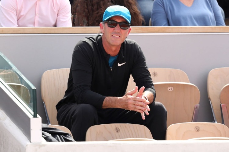 DARREN CAHILL, coach of Simona Halep of Romania watches her face Angelique Kerber of Germany in the ladies singles quarter finals match during the 2018 French Open at Roland Garros in Paris, France.