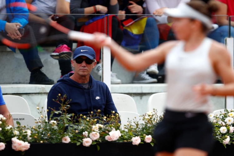 DARREN CAHILL coach of Simona Halep of Romania watches on in her match against Naomi Osaka of Japan during the Internazionali BNL d'Italia 2018 tennis at Foro Italico in Rome, Italy.