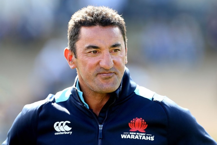 DARYL GIBSON, coach of the Waratahs, looks on ahead of the Super Rugby pre-season match between the Highlanders and the Waratahs in Queenstown, New Zealand.