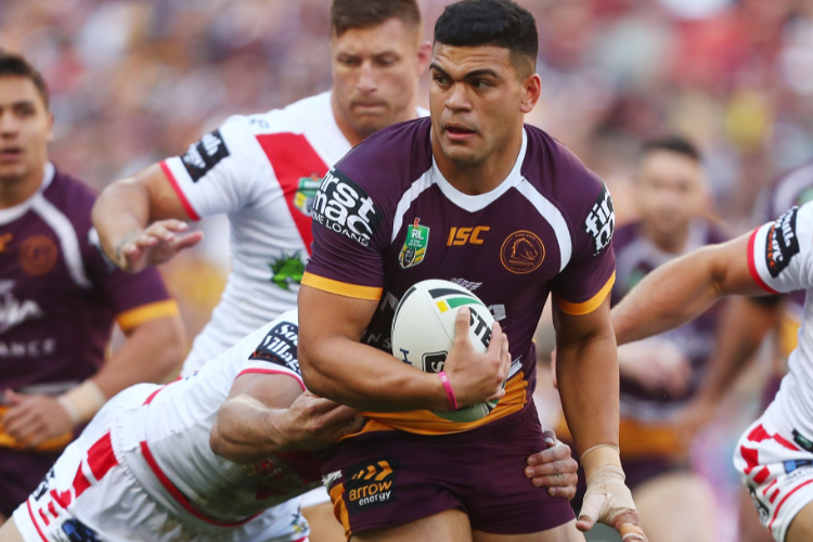 DAVID FIFITA of the Broncos is tackled during the NRL Elimination Final match between the Brisbane Broncos and the St George Illawarra Dragons at Suncorp Stadium in Brisbane, Australia.