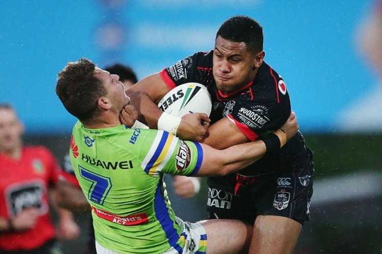 DAVID FUSITUA of the Warriors charges into Aidan Sezer of the Raiders during the NRL match between the New Zealand Warriors and the Canberra Raiders at Mt Smart Stadium in Auckland, New Zealand. DAVID FUSITUA of the Warriors charges into Aidan Sezer of the Raiders during the NRL match between the New Zealand Warriors and the Canberra Raiders at Mt Smart Stadium in Auckland, New Zealand.
