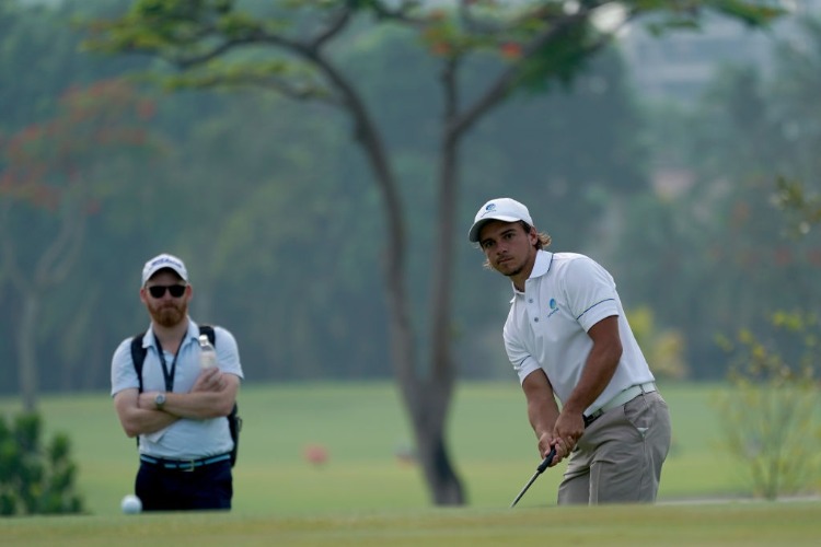 DAVID MICHELUZZI of Australia in action during the Asia-Pacific Amateur Championship at Sentosa Golf Club in Singapore.