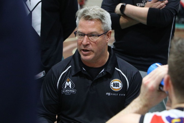 Melbourne United Head Coach DEAN VICKERMAN talks to his players during the NBL Blitz match between the Brisbane Bullets and Melbourne United at BM in Ballarat, Australia.
