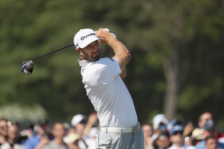 DUSTIN JOHNSON of the United States plays his shot during the 2018 U.S. Open at Shinnecock Hills Golf Club in Southampton, New York.