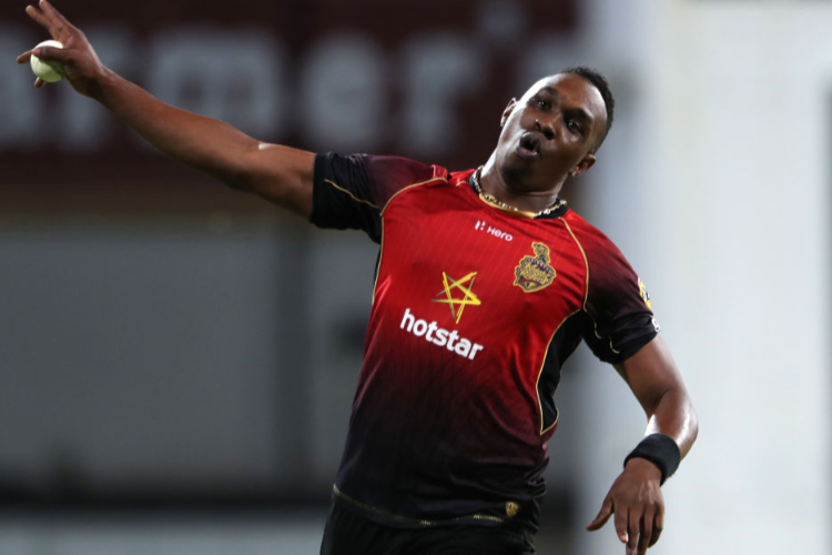 DWAYNE BRAVO of Trinbago Knight Riders celebrates during the Hero Caribbean Premier League match between Barbados Tridents and Trinbago Knight Riders at Kensington Oval in Bridgetown, Barbados.