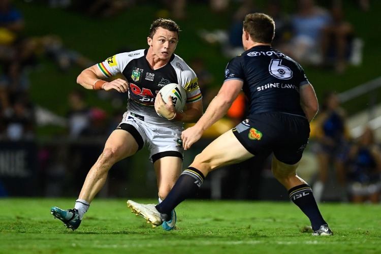 DYLAN EDWARDS of the Panthers looks to get past Michael Morgan of the Cowboys during the NRL match between the North Queensland Cowboys and the Penrith Panthers at 1300SMILES Stadium in Townsville, Australia.