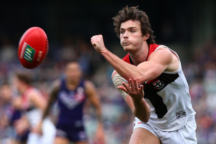 DYLAN ROBERTON of the Saints handballs during the AFL match between the Fremantle Dockers and the St Kilda Saints at Domain Stadium in Perth, Australia.