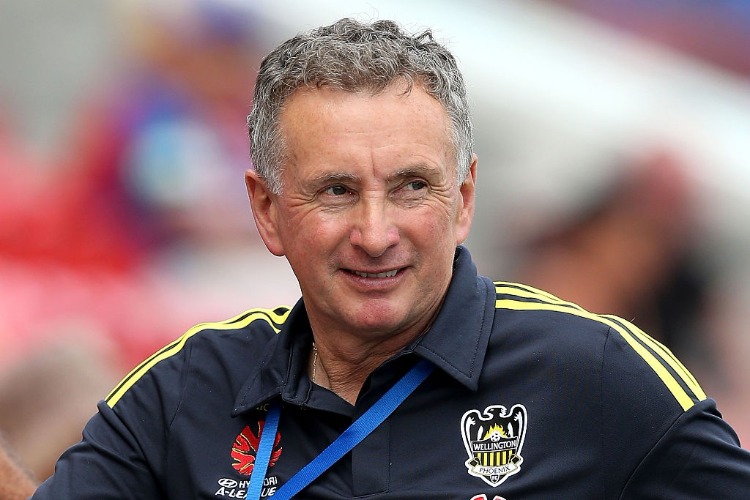 ERNIE MERRICK coach of the Phoenix watches on during the A-League match between the Newcastle Jets and Wellington Phoenix at Hunter Stadium in Newcastle, Australia. ERNIE MERRICK coach of the Phoenix watches on during the A-League match between the Newcastle Jets and Wellington Phoenix at Hunter Stadium in Newcastle, Australia.