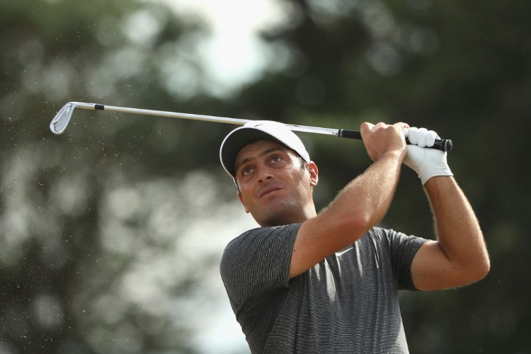 FRANCESCO MOLINARI of Italy plays his shot during the 147th Open Championship at Carnoustie Golf Club in Carnoustie, Scotland. FRANCESCO MOLINARI of Italy plays his shot during the 147th Open Championship at Carnoustie Golf Club in Carnoustie, Scotland.