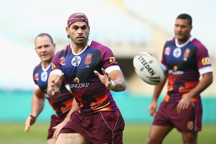 GREG INGLIS catches a pass during a Queensland Maroons State of Origin training session at ANZ Stadium in Sydney, Australia.