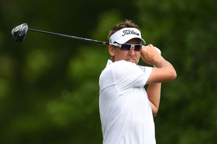 IAN POULTER of England hits his tee shot during the Houston Open at the Golf Club of Houston in Humble, Texas.