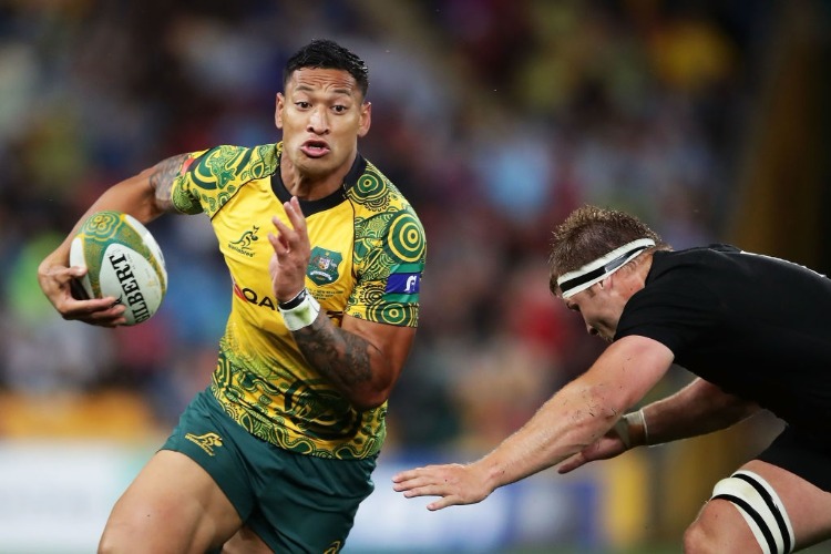 ISRAEL FOLAU of the Wallabies takes on the defence during the Bledisloe Cup match between the Australian Wallabies and the New Zealand All Blacks at Suncorp Stadium in Brisbane, Australia.