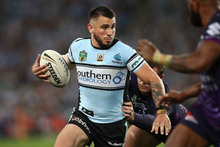 JACK BIRD of the Sharks is tackled during the 2016 NRL Grand Final match between the Cronulla Sharks and the Melbourne Storm at ANZ Stadium in Sydney, Australia. JACK BIRD of the Sharks is tackled during the 2016 NRL Grand Final match between the Cronulla Sharks and the Melbourne Storm at ANZ Stadium in Sydney, Australia.