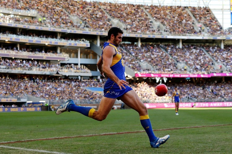 JACK DARLING of the Eagles kicks on goal during the AFL match between the West Coast Eagles and the Richmond Tigers at Optus Stadium in Perth, Australia. JACK DARLING of the Eagles kicks on goal during the AFL match between the West Coast Eagles and the Richmond Tigers at Optus Stadium in Perth, Australia.