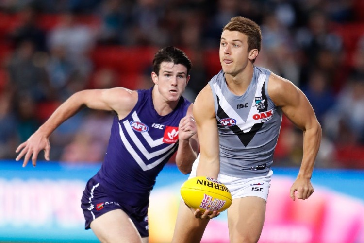 JACK TRENGOVE of the Power and ANDREW BRAYSHAW of the Dockers in action during the AFLX match between the Port Adelaide Power and the Fremantle Dockers at Hindmarsh Stadium in Adelaide, Australia.