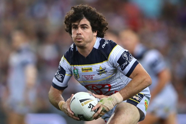 JAKE GRANVILLE of the Cowboys runs the ball during the 2017 NRL Grand Final match between the Melbourne Storm and the North Queensland Cowboys at ANZ Stadium in Sydney, Australia.