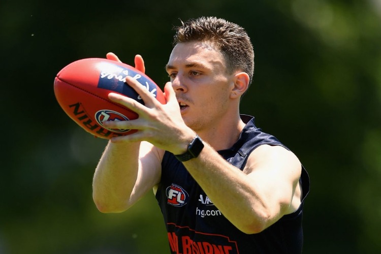 JAKE LEVER of the Demons marks during a Melbourne Demons AFL pre-season training session at Gosch's Paddock in Melbourne, Australia.