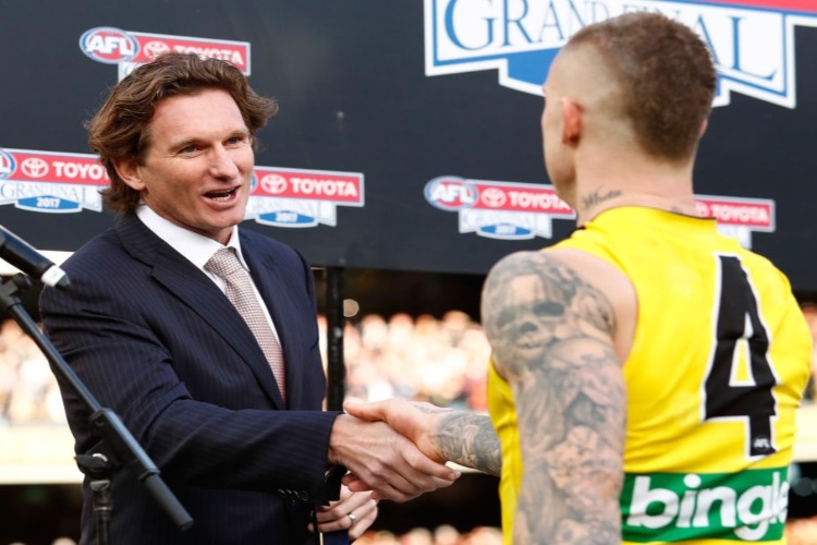 JAMES HIRD presents the Norm Smith Medal to Dustin Martin of the Tigers Adelaide Crows and the Richmond Tigers at the MCG in Melbourne, Australia.