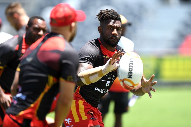 JAMES SEGEYARO catches the ball during a PNG Kumuls Rugby League World Cup captain's run in Port Moresby, Papua New Guinea.