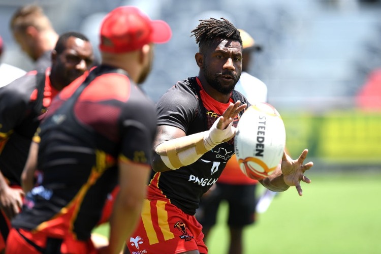 JAMES SEGEYARO catches the ball during a PNG Kumuls Rugby League World Cup captain's run in Port Moresby, Papua New Guinea. JAMES SEGEYARO catches the ball during a PNG Kumuls Rugby League World Cup captain's run in Port Moresby, Papua New Guinea.