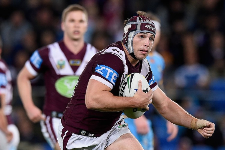 JAMIE BUHRER of the Sea Eagles runs with the ball during the NRL match between the Gold Coast Titans and the Manly Sea Eagles at Cbus Super Stadium in Gold Coast, Australia.