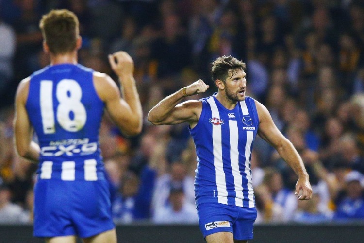 JARRAD WAITE of the Kangaroos celebrates a goal during the AFL match between the North Melbourne Kangaroos and the Hawthorn Hawks at Etihad Stadium in Melbourne, Australia.