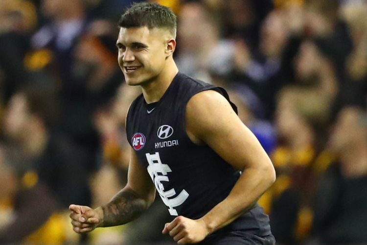 JARROD PICKETT of the Blues celebrates after kicking a goal during the AFL match between the Carlton Blues and the Hawthorn Hawks at Etihad Stadium in Melbourne, Australia.