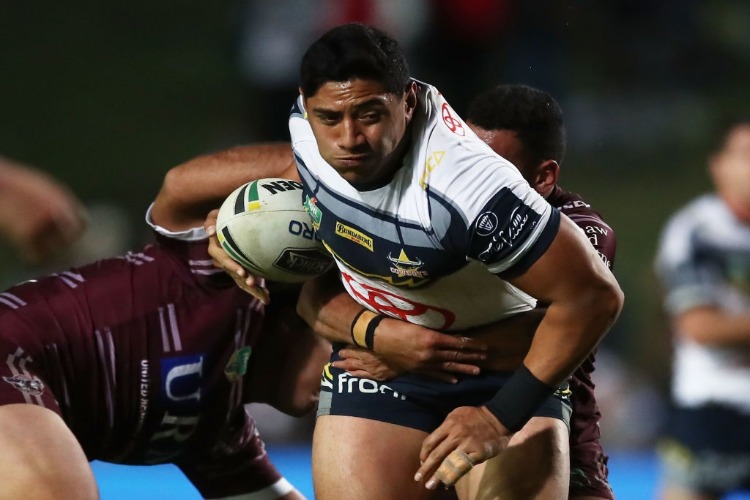 JASON TAUMALOLO of the Cowboys is tackled during the NRL match between the Manly Sea Eagles and the North Queensland Cowboys at Lottoland in Sydney, Australia. JASON TAUMALOLO of the Cowboys is tackled during the NRL match between the Manly Sea Eagles and the North Queensland Cowboys at Lottoland in Sydney, Australia.