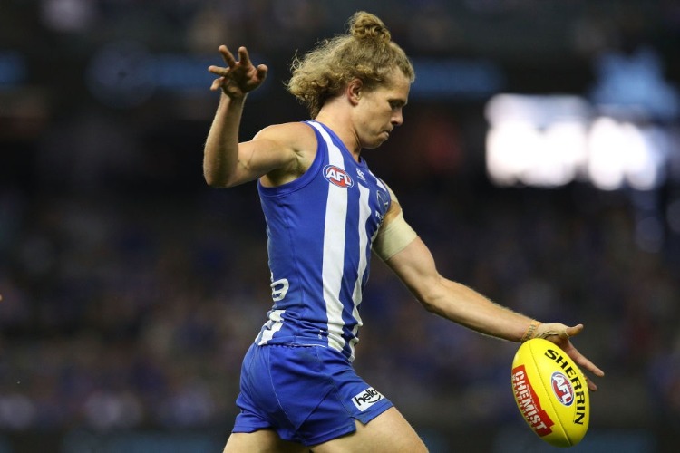 JED ANDERSON of the Kangaroos in action during the AFL match between the North Melbourne Kangaroos and Port Adelaide Power at Etihad Stadium in Melbourne, Australia.