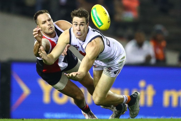 JEREMY CAMERON of the Giants and Nathan Brown of the Saints compete for the ball during the AFL match between the St Kilda Saints and the Greater Western Sydney Giants at Etihad Stadium in Melbourne, Australia.