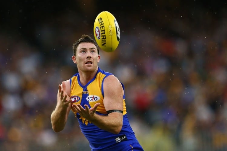 JEREMY MCGOVERN of the Eagles marks the ball during the AFL match between the West Coast Eagles and the Sydney Swans at Optus Stadium in Perth, Australia.
