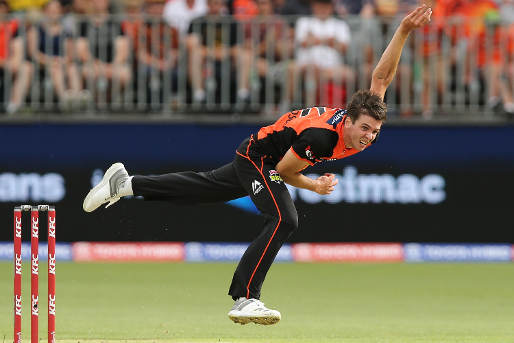 JHYE RICHARDSON of the Scorchers bowls during the Big Bash League match between the Perth Scorchers and the Adelaide Strikers at Optus Stadium in Perth, Australia.