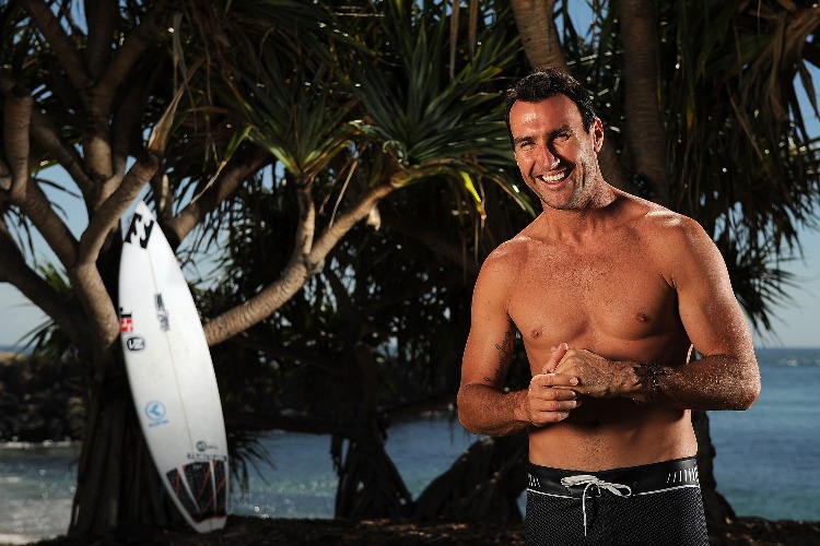 ASP World Champion JOEL PARKINSON poses during a portrait shoot at Duranbah Beach in Tweed Heads, Australia.