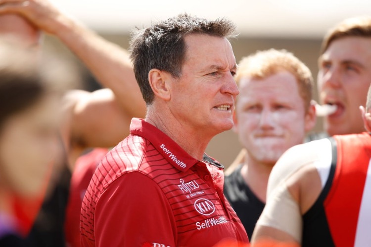 JOHN WORSFOLD, Senior Coach of the Bombers addresses his players during the AFL 2018 JLT Community Series match between the Geelong Cats and the Essendon Bombers at Central Reserve in Colac, Australia.