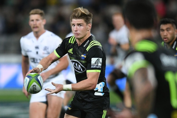 JORDIE BARRETT of the Hurricanes passes during the Super Rugby match between the Hurricanes and the Sharks at McLean Park in Napier, New Zealand.