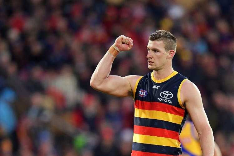 JOSH JENKINS of the Crows celebrates after kicking a goal during the AFL match between the Adelaide Crows and the West Coast Eagles at Adelaide Oval in Adelaide, Australia.
