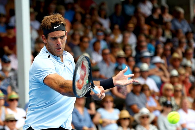 JUAN MARTIN DEL POTRO of Argentina plays a forehand against Roberto Bautista Agut of Spain during the ASB Men's Classic at ASB Tennis Centre in Auckland, New Zealand.