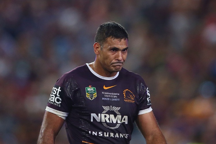JUSTIN HODGES of the Broncos looks dejected after defeat during the NRL Grand Final match between the Brisbane Broncos and the North Queensland Cowboys at ANZ Stadium in Sydney, Australia.