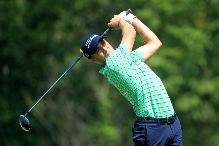 JUSTIN THOMAS plays his shot during the World Golf Championships-Bridgestone Invitational at Firestone Country Club South Course in Akron, Ohio. JUSTIN THOMAS plays his shot during the World Golf Championships-Bridgestone Invitational at Firestone Country Club South Course in Akron, Ohio.